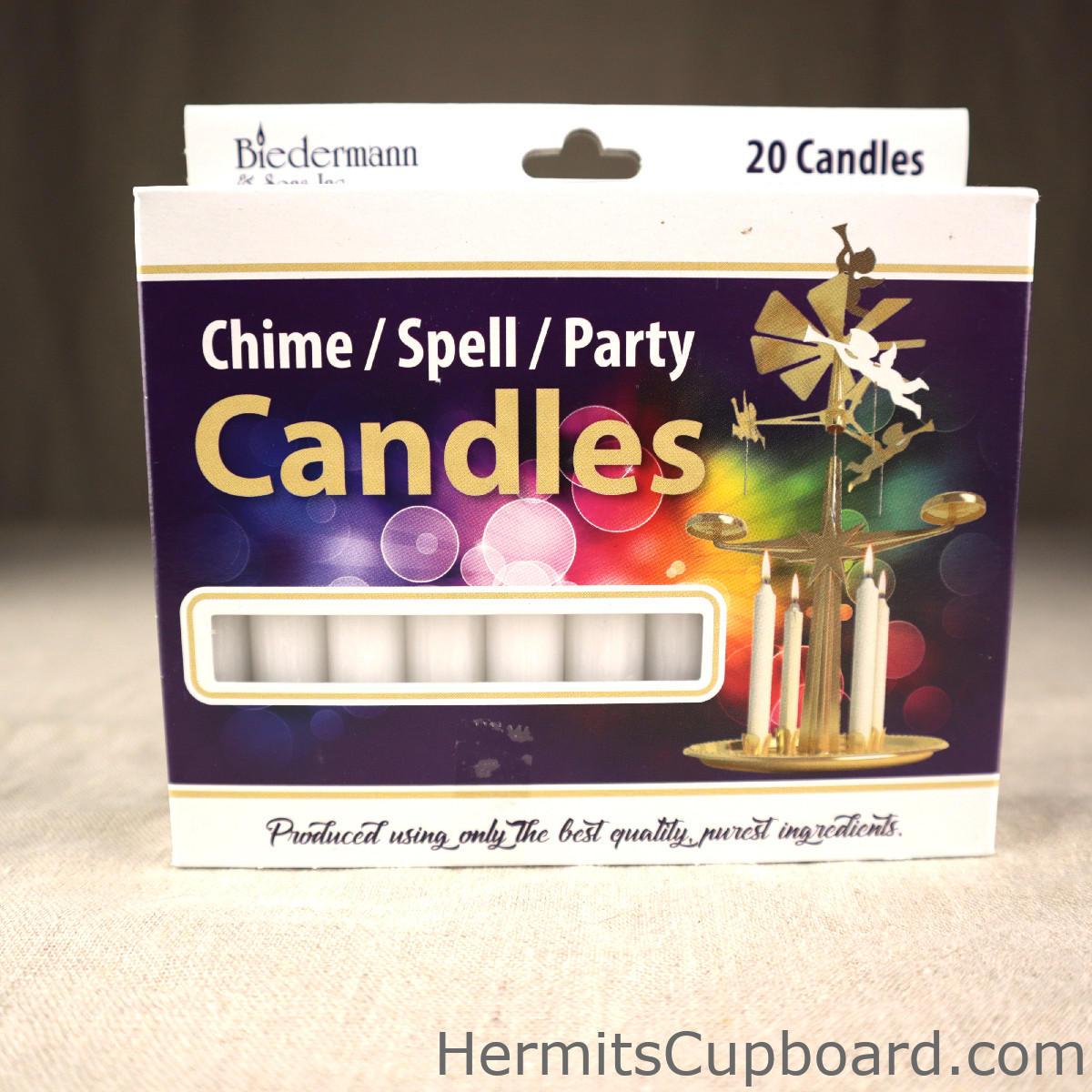White Chime Candle Box front with White candles showing through a cut-out